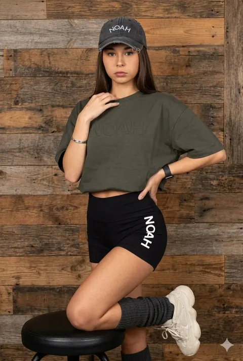 Latina Model in Distressed Denim and Wood Background